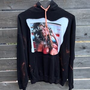 Redesigned Graphic Black Hoodie with Orange Accents by “Jagged Threads”